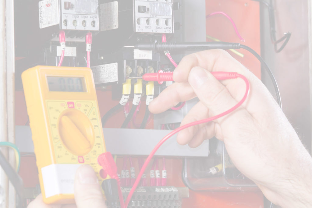 Electrician using Multimeter
